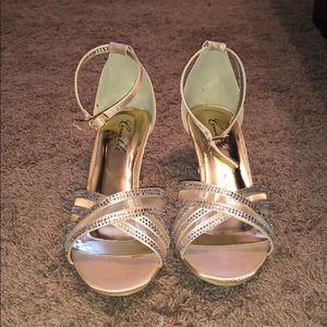 Gold high heels